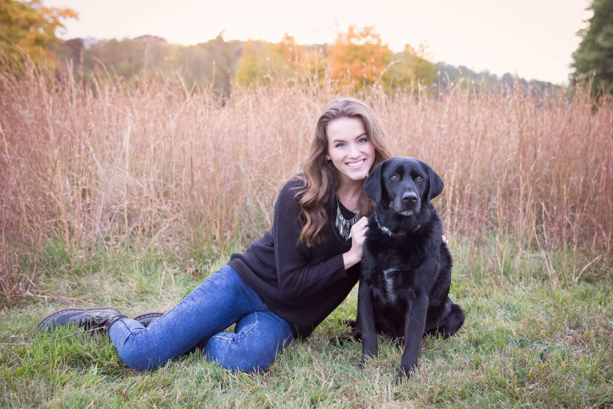 pittsburgh senior portrait in field with black lab dog